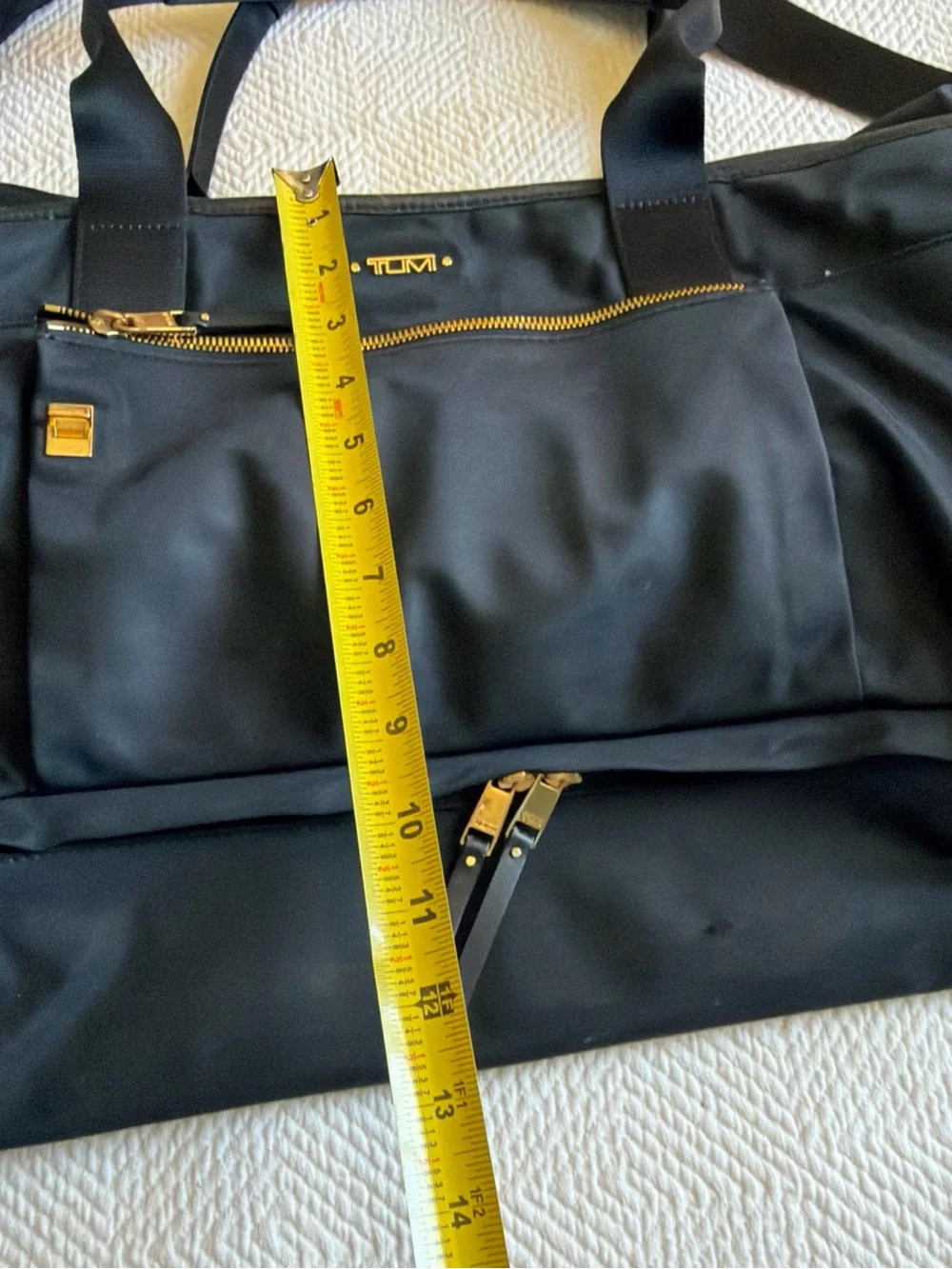 Tumi Black Duffel Bag with Gold Hardware